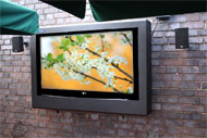 Armario televisión exterior de Armagard en una terraza Armario televisión exterior de Armagard en una terraza